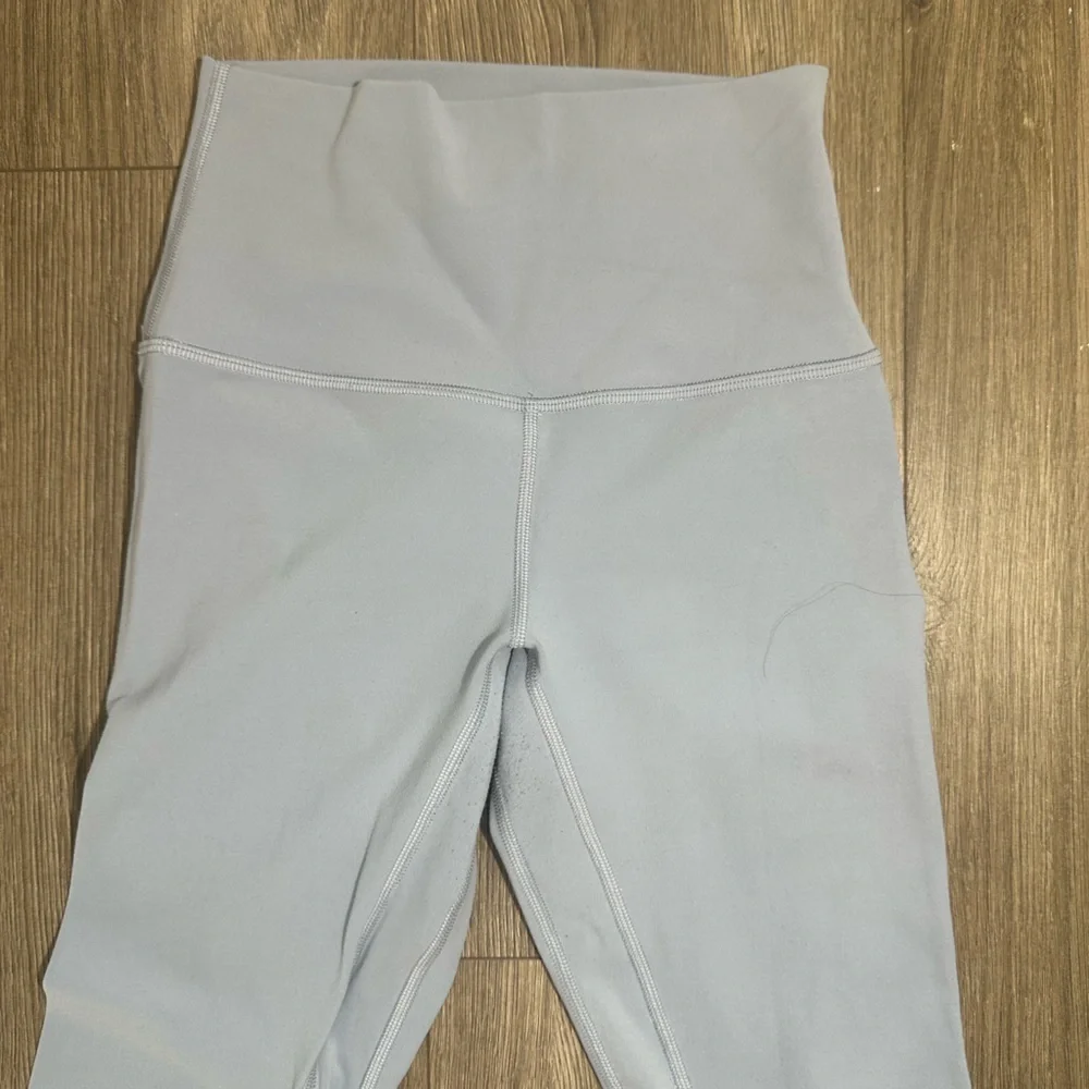 lululemon light blue high-rise leggings with center back logo